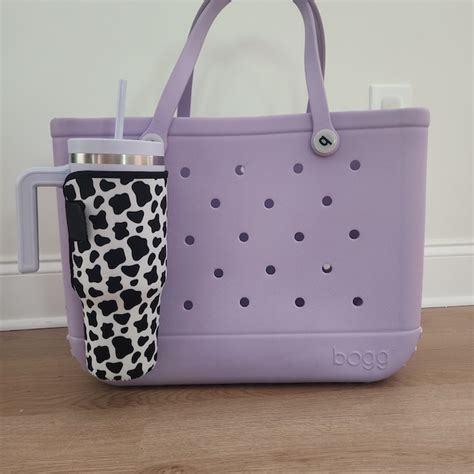 purse with cup holders inside.